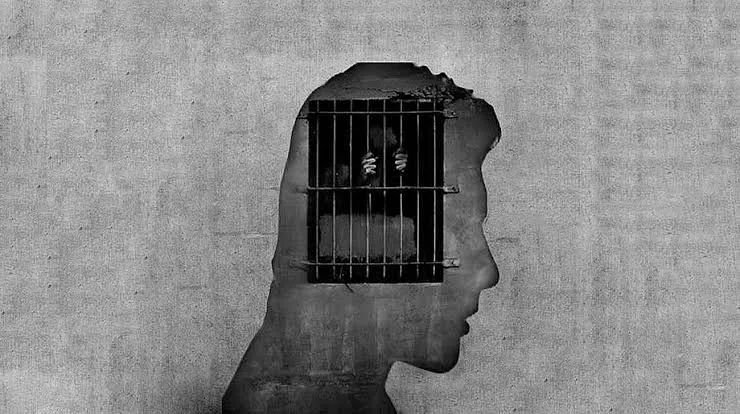 image of a person imprisoned in their mind